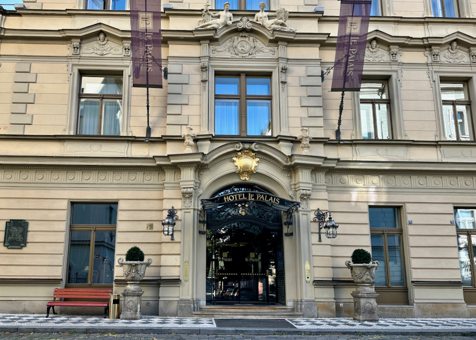 Elegant doorway of a historic hotel in Prague