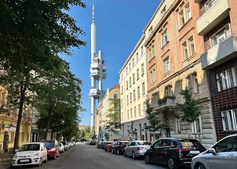 Large antennae-like tower at the end of a residential street.