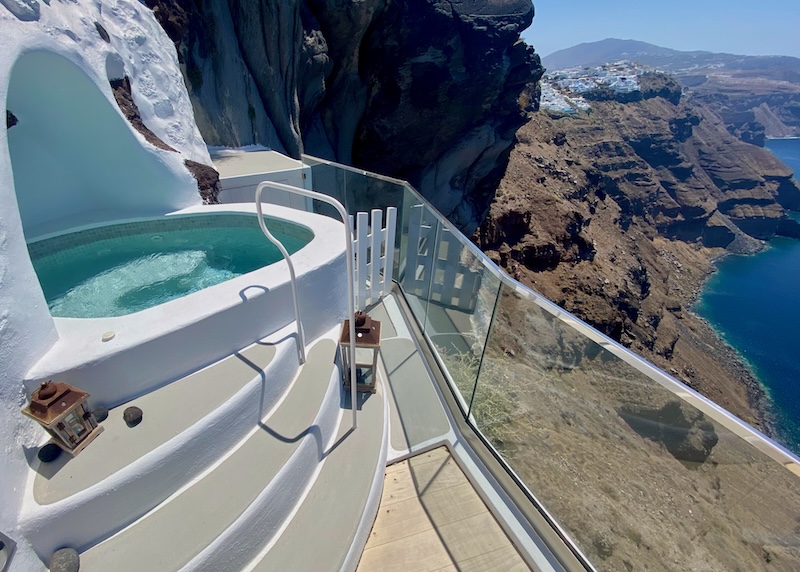A partially covered cave pool overlooking the caldera at Iconic hotel in Imerovigli.