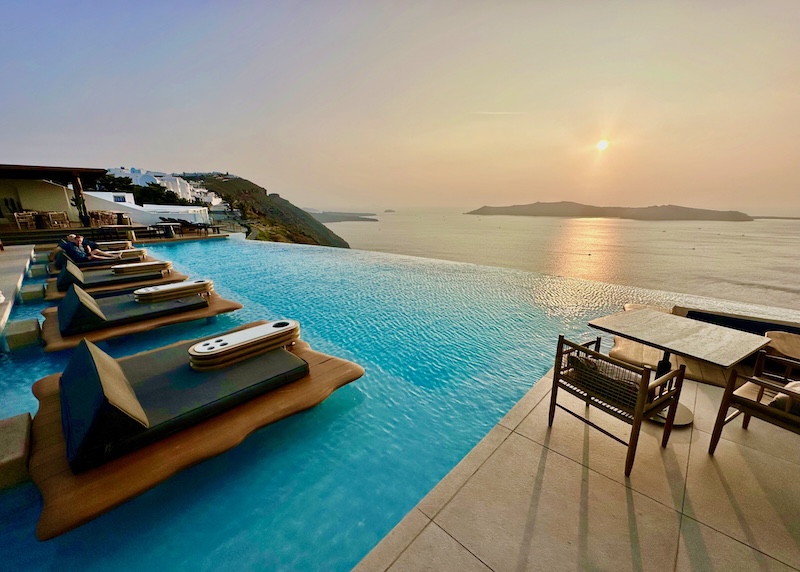 View toward the sunset from the infinity pool at Cavo Tagoo hotel in Santorini.
