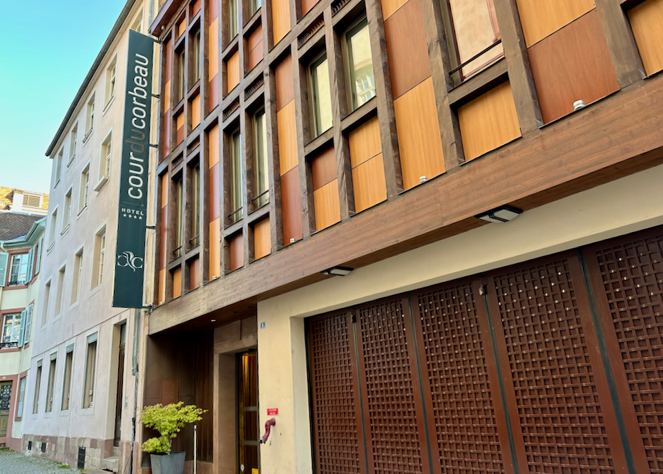 Entrance exterior of a modern hotel, shown from the side