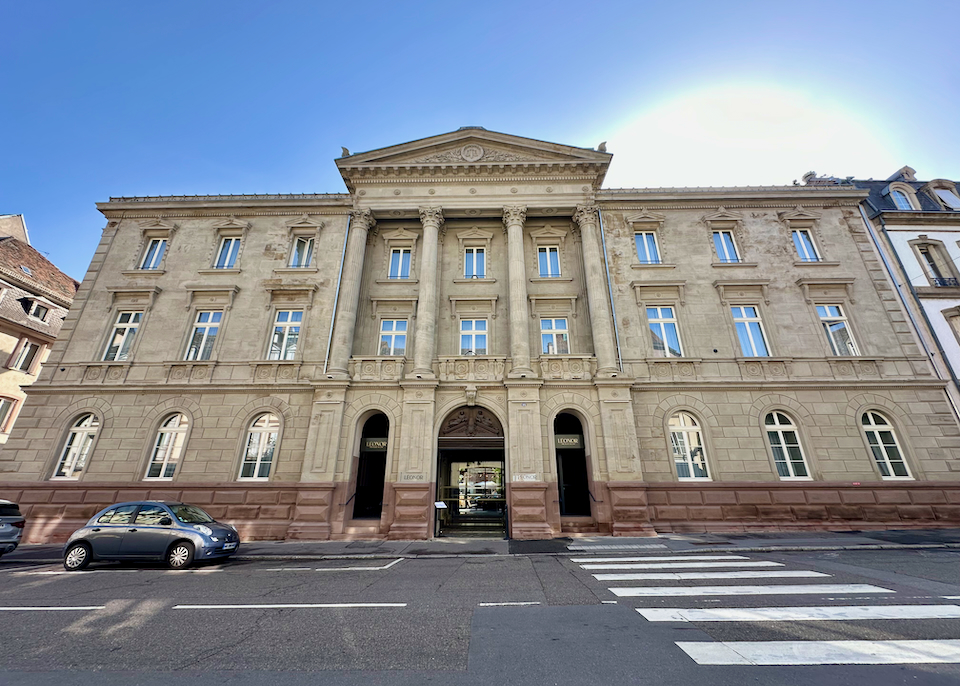 Exterior of a large stone hotel building