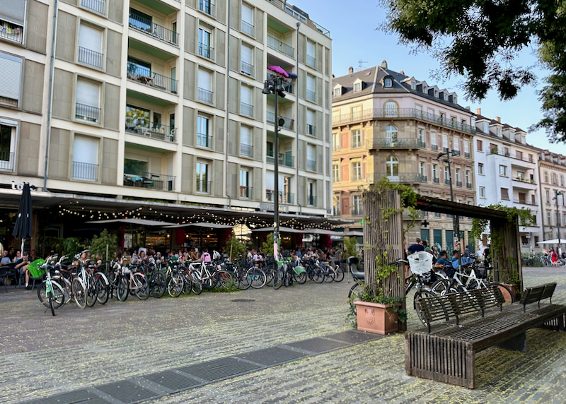 Pedestrian square with lots of parked bikes