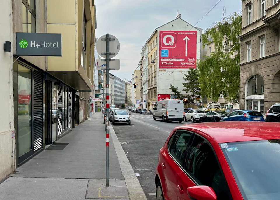 Side view of a small budget hotel on an urban street