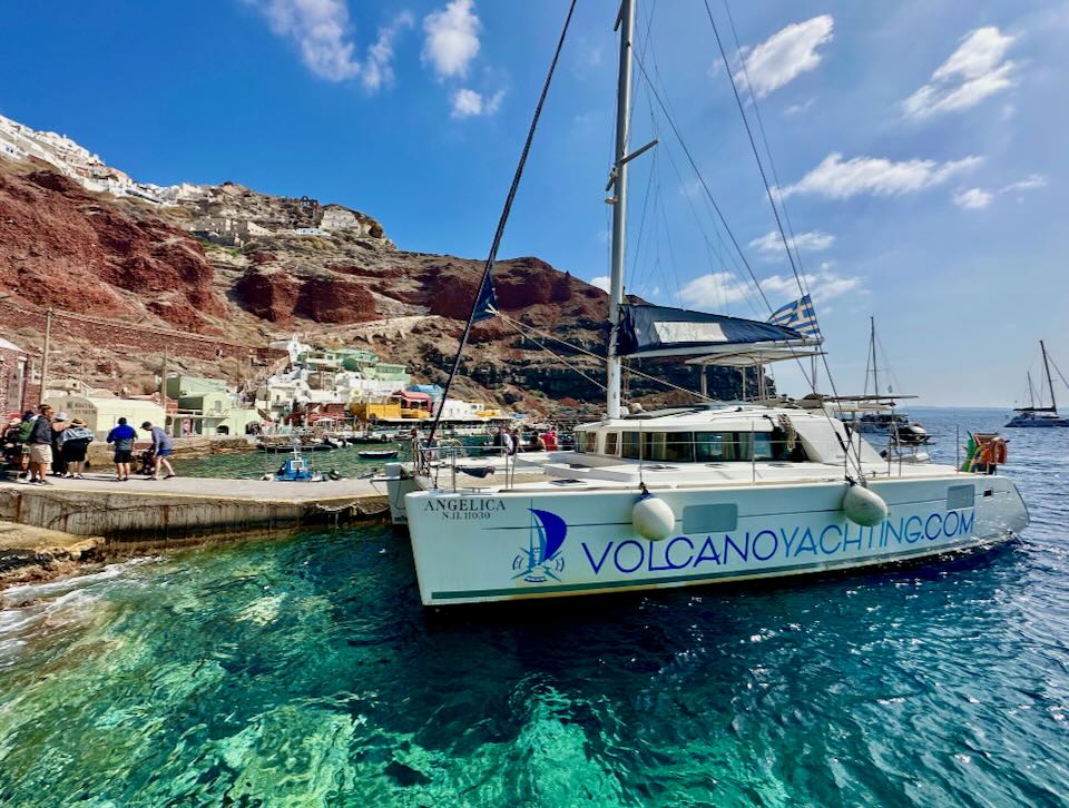 Santorini boat tour in September-October shoulder season.
