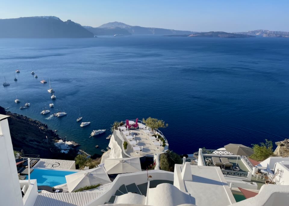 Oia hotel restaurant with caldera view.