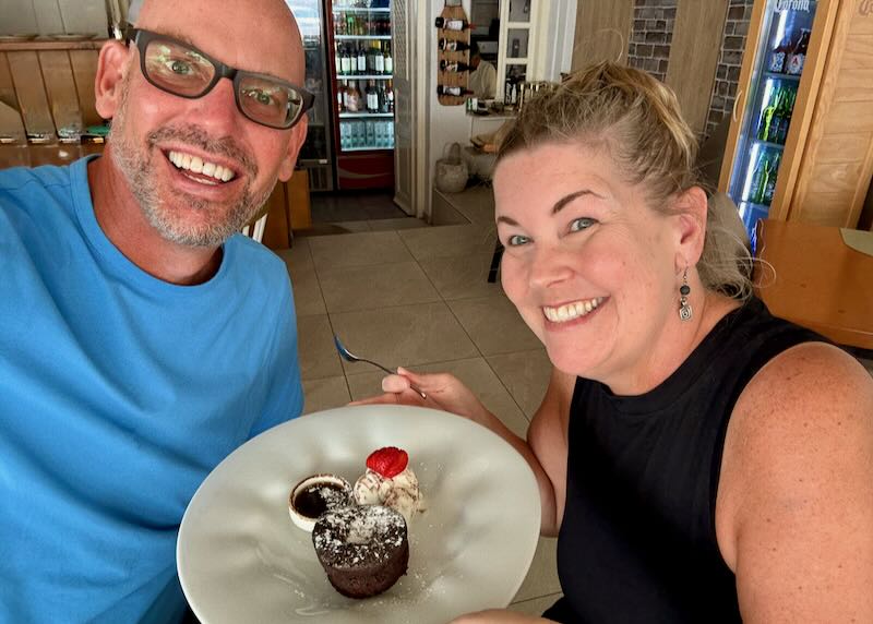 Me and my wife having dessert at a Santorini restaurant.