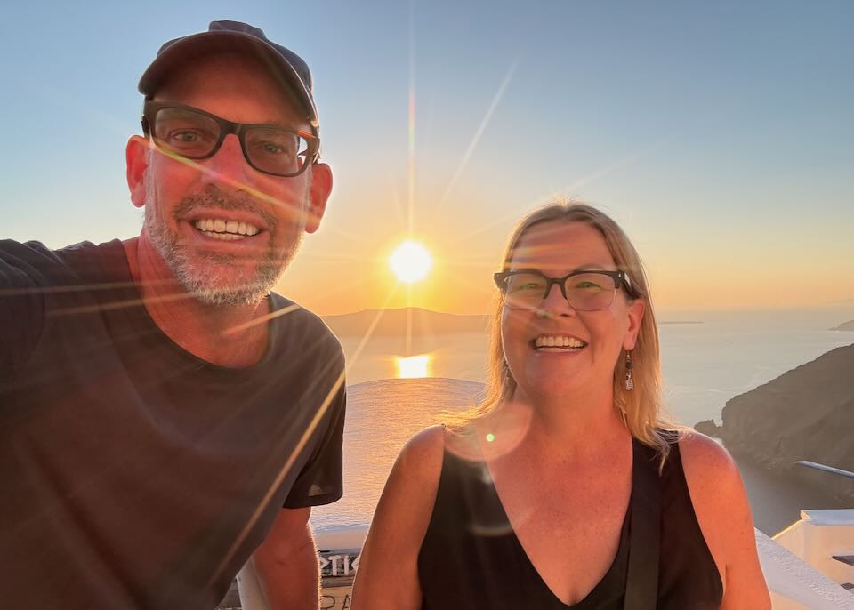 Me and my wife enjoying a Santorini sunset.