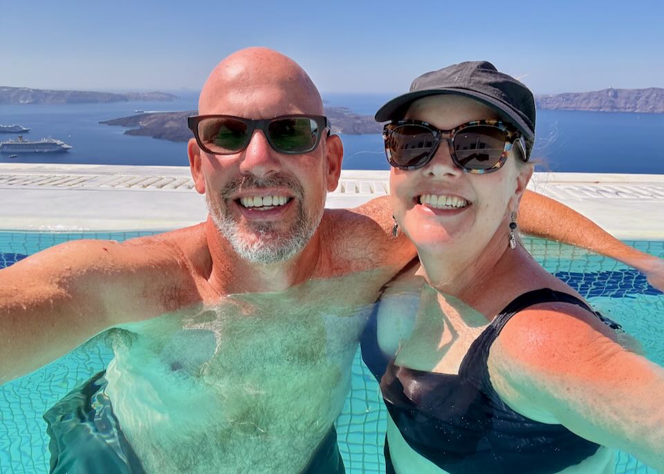My wife and I in a Santorini infinity pool.