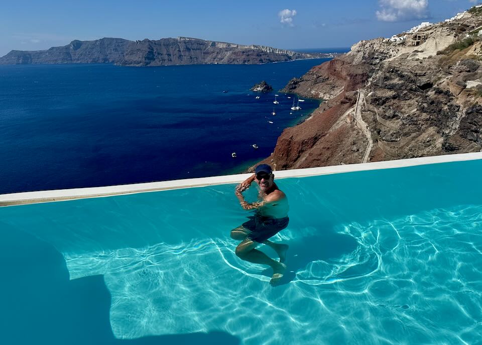 Me swimming at the Katikies Infinity pool in Oia.