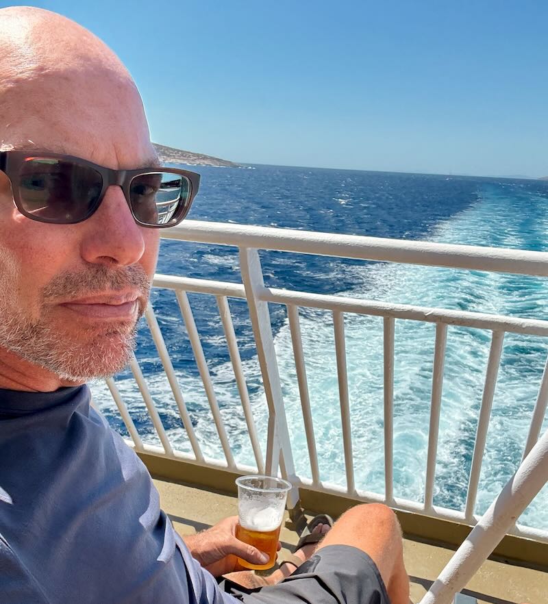 Me on the deck of a ferry in Greece.