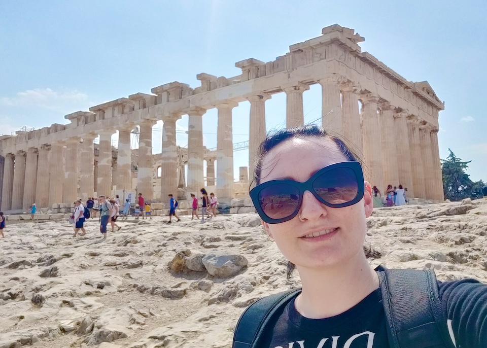 A selfie of Lindsey in front of the Parthenon in Athens