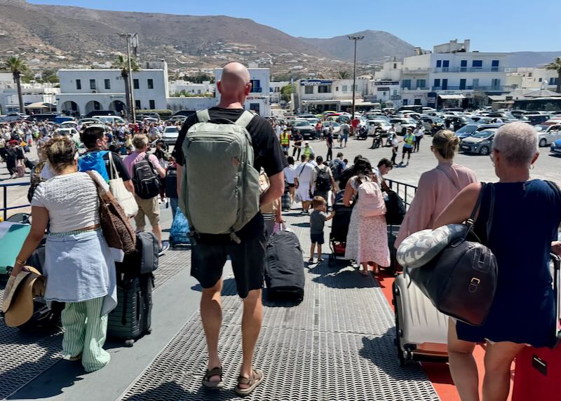 Me with my travel backpack on the Greek islands.