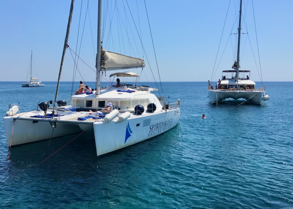 Private boat charters in the Santorini caldera.