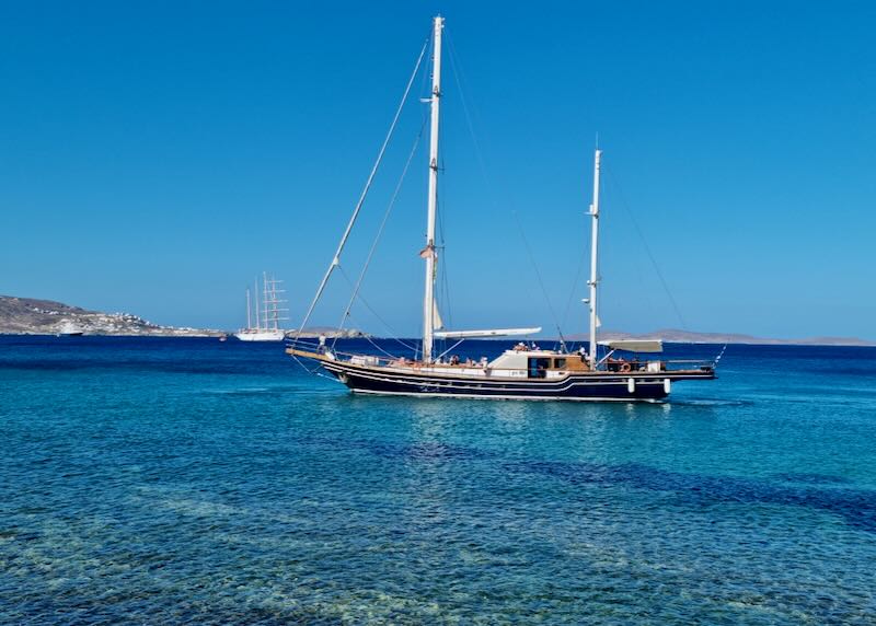 Mykonos small group boat tour to beaches and swimming.