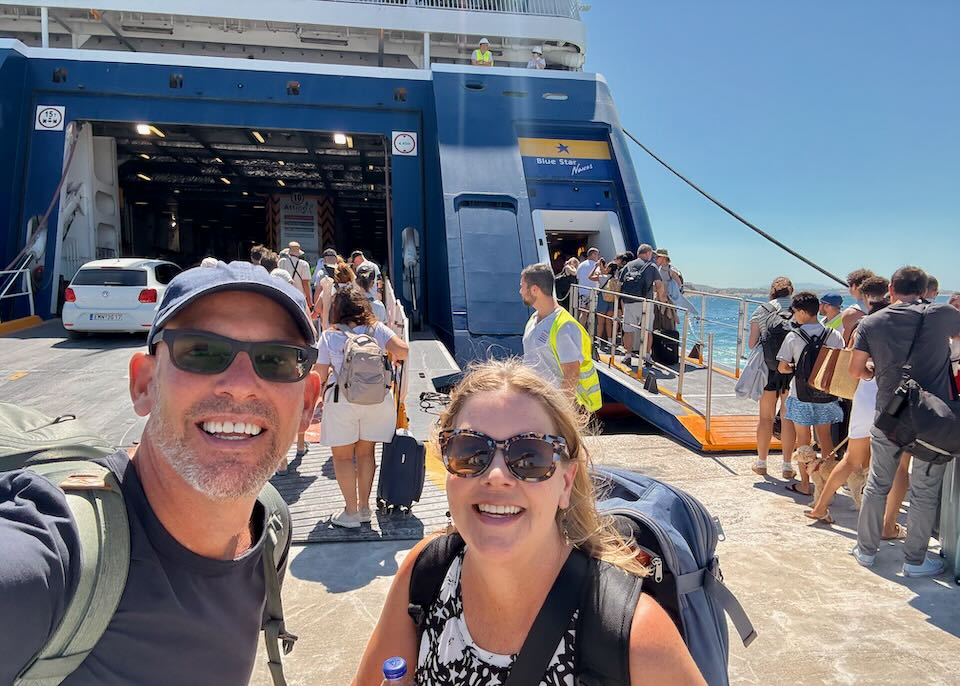 My wife and I boarding a ferry in Greece.
