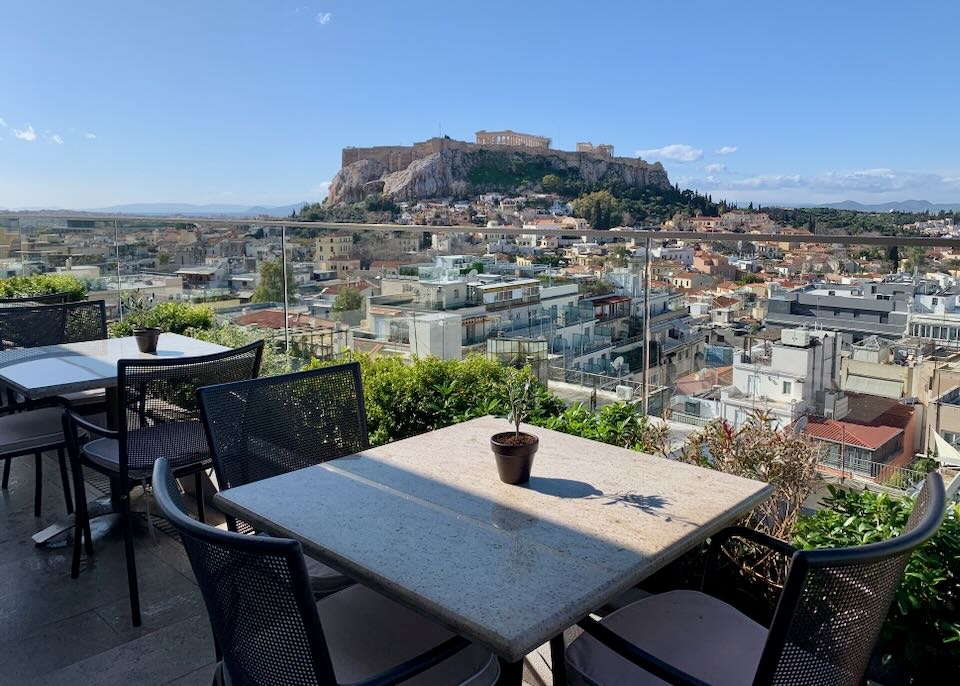 Hotel with rooftop view of Acropolis in Athens.
