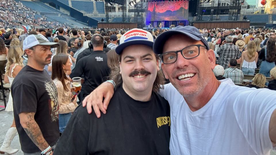 Santorini Dave and his son at concert.