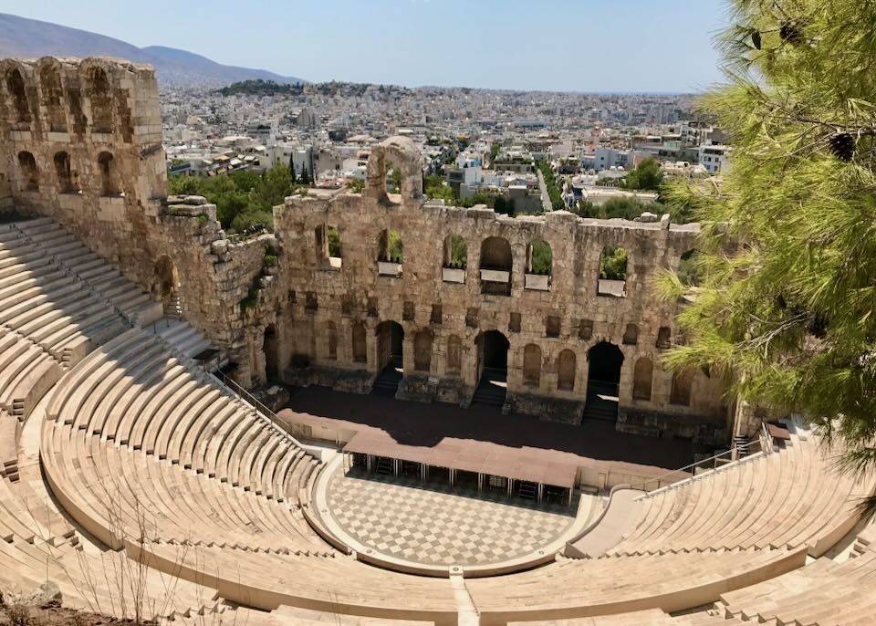 The Odeon of Herodes Atticus and Koukaki neighborhood in the background.