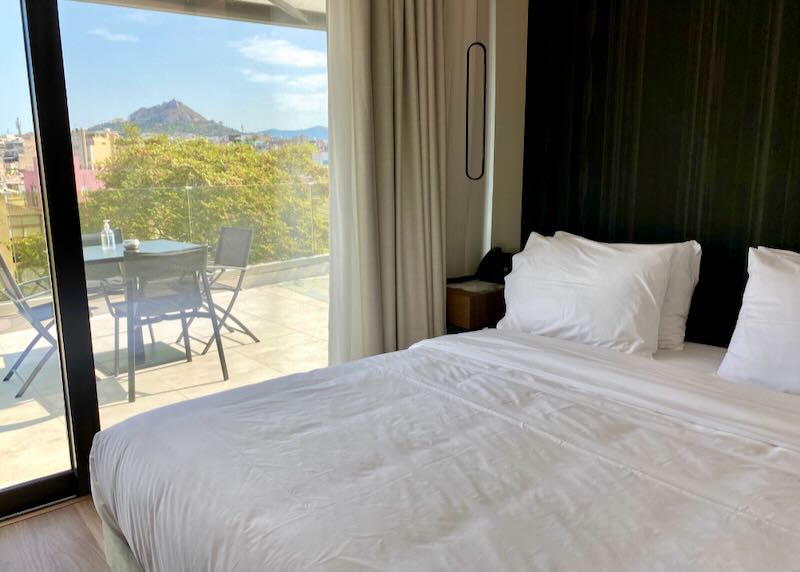 Athens hotel with large patio and view.