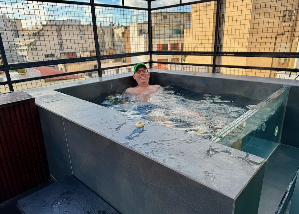 Santorini Dave in a private plunge pool in Athens.