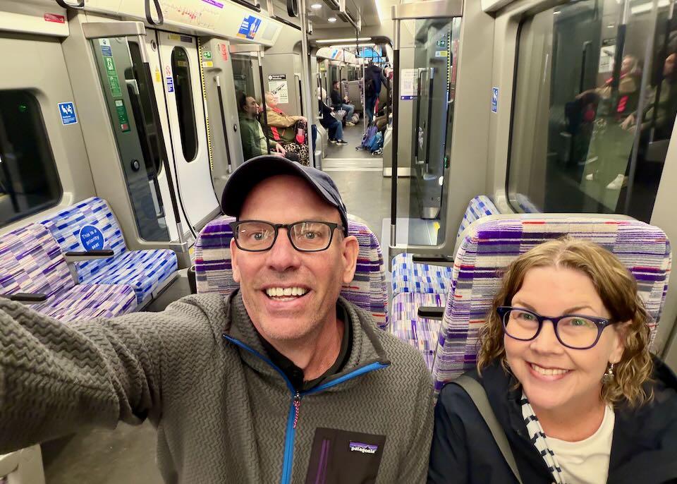Santorini Dave and his wife on the Elizabeth Line in London.