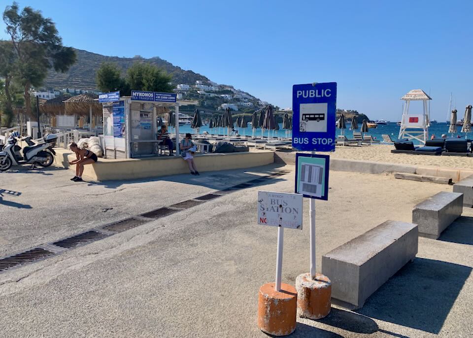 Bus stop at Ornos Beach.