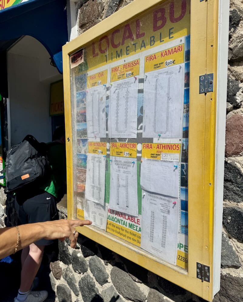 Bus schedules at Fira bus station.