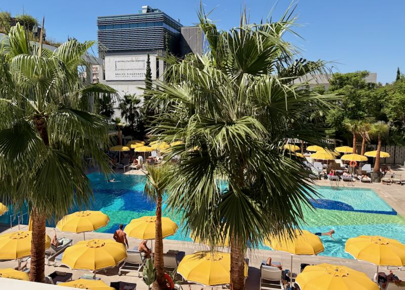 Luxury hotel with large outdoor pool in Athens.