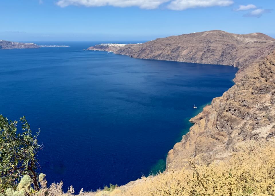 Boat in Santorini caldera. 
