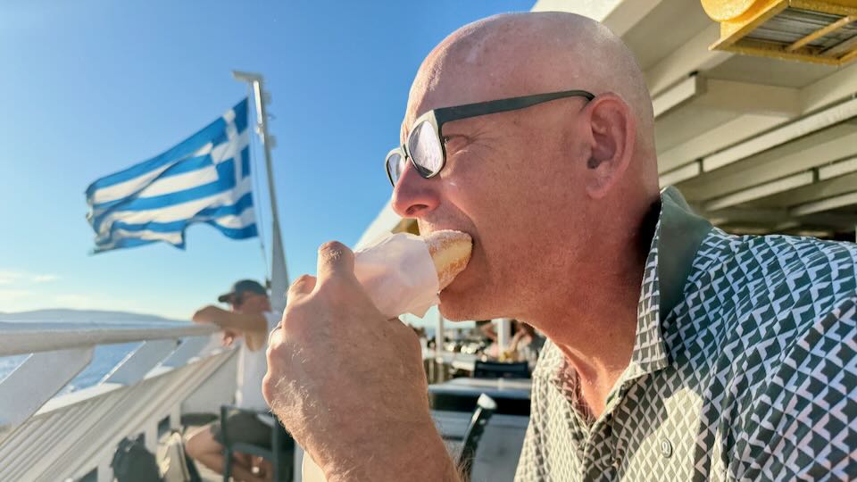 Santorini Dave on a ferry in Greece.