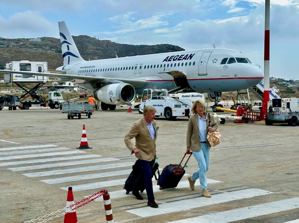 Arriving at the Mykonos airport on an international flight.