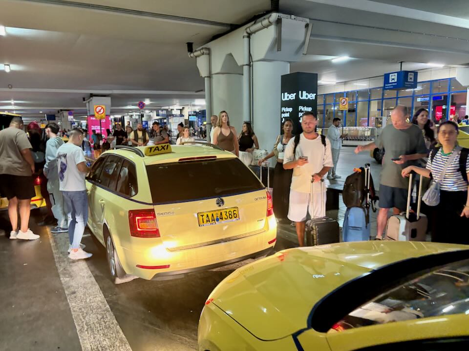 Taxi and Uber lines at Athens Airport. 